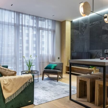 Sleek and luxurious living room with modern furnishings and elegant decor.